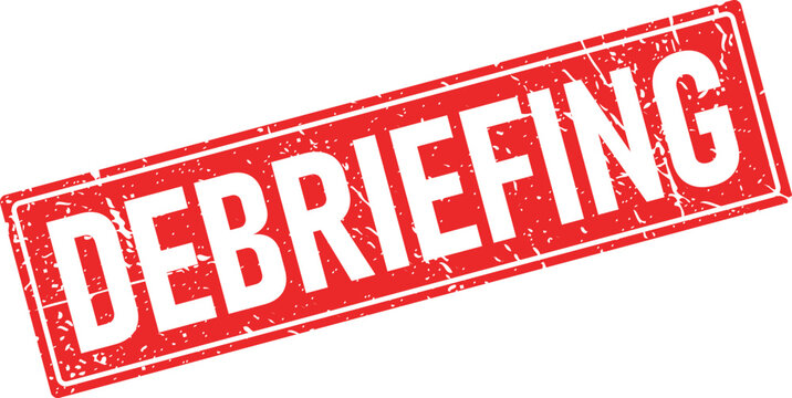 Distressed rectangular red rubber stamp displaying the word DEBRIEFING in white, for post event review