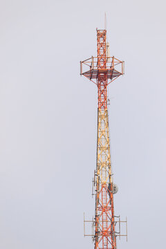 Telecommunication lattice tower with maintenance platform, lightning rod, antenna mounts and steel mast structure for wireless broadcasting and communication infrastructure systems