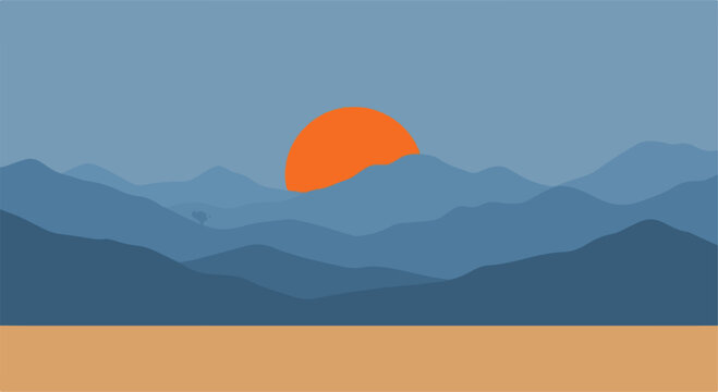 Bright orange sun rising over blue mountain layers