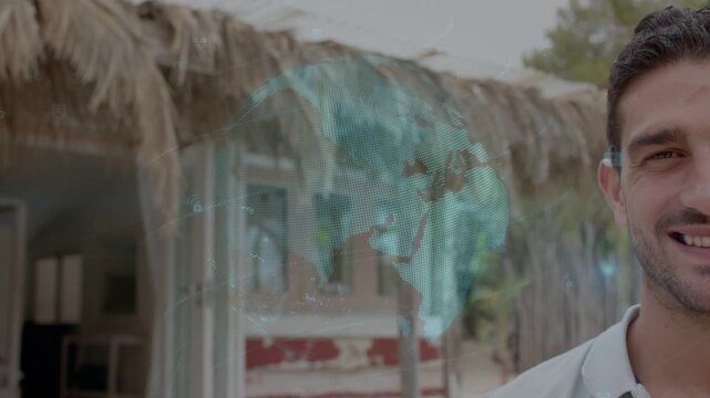AR app activating, man standing right watching dotted globe rotating over thatch roof, showing tech