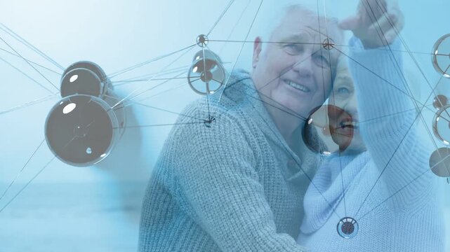 Sr pair hugging sea she pointing inviting he turning as IT nodes drifting over faces