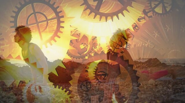 Sunset cueing couple to stretch on beach, rising into cobra, gears moving over figures for fitness