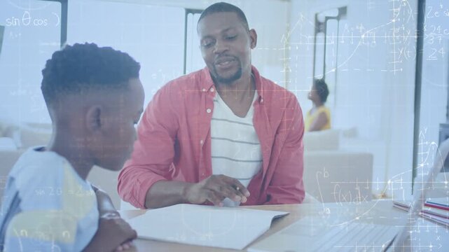 Man guiding child through homework, leaning forward writing notebook, pointing pencil by laptop