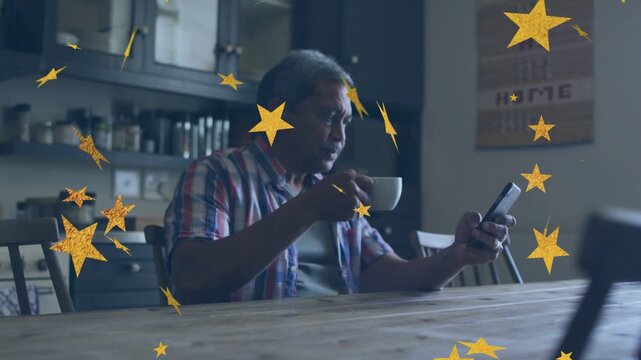 Senior man sitting table sipping white mug scrolling phone, creating yellow stars over mug for tech