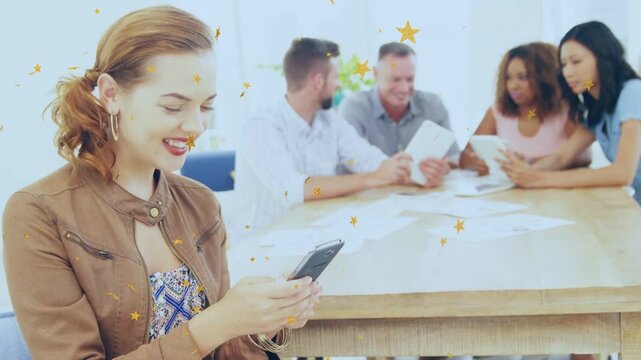 Woman in foreground tapping phone, checking work app and causing gold stars, team reviewing tablet