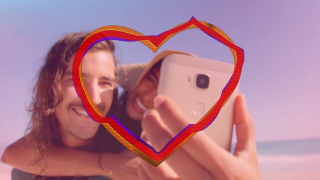 Woman raising phone on man's back, starting heart pulsing around them, pair capturing social selfie