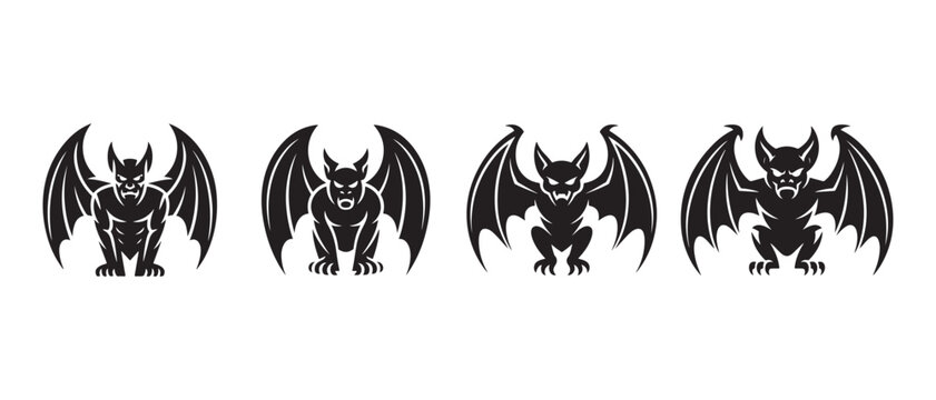 Set of black gargoyle silhouettes. with bat wings on a white background.