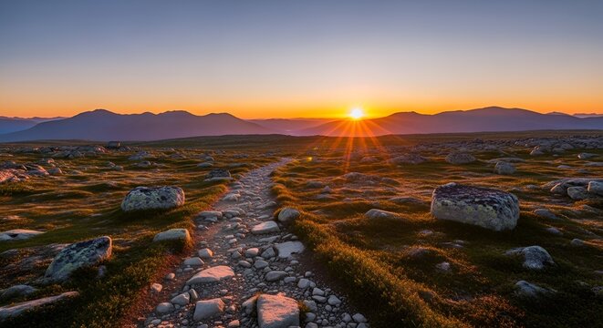 Scenic mountain path at sunset, vast landscape, vibrant sky, natural beauty