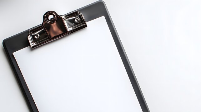 Blank Clipboard with Metal Clip on White Background.