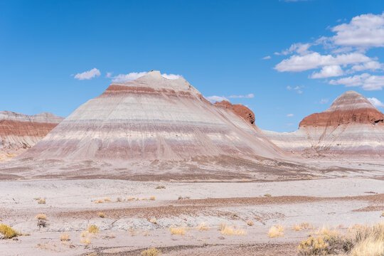 Petrified Forest National Park in Arizona. The Tepees, conical hills with banded mudstones resembling Tipis or Male Hogans. Trailhead for the Historic Blue Forest Trail. 