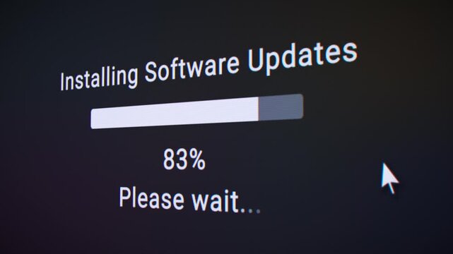 Video animation of a fictitious website with a black screen showing a progress bar for installing system update - software update in process.