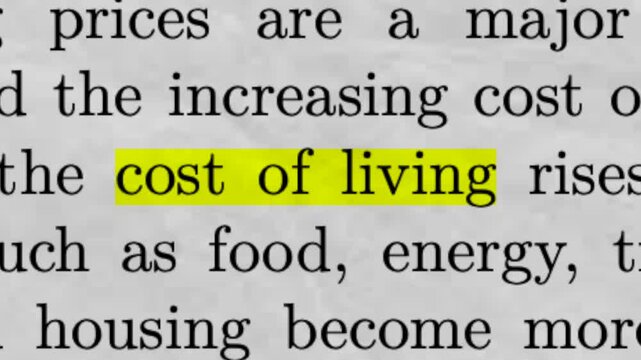 Cost of Living highlighted in article text with fast scrolling documentary style background