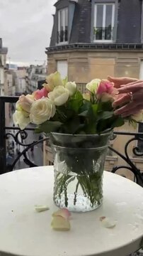 Arranging White and Pink Roses in Clear Glass Vase with City Background, Elegant English Style Floral Decor Concept