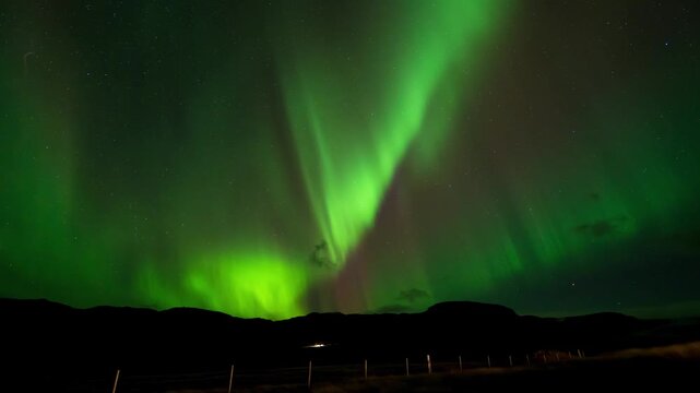 Incredibly Intense Green, Purple and Red Aurora Borealis 4K Horizontal Time-lapse Over Arctic Landscape in Iceland
