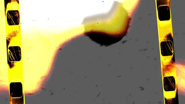 Film punch hole countdown leader. Retro cinema movie start sequence with analog grain.