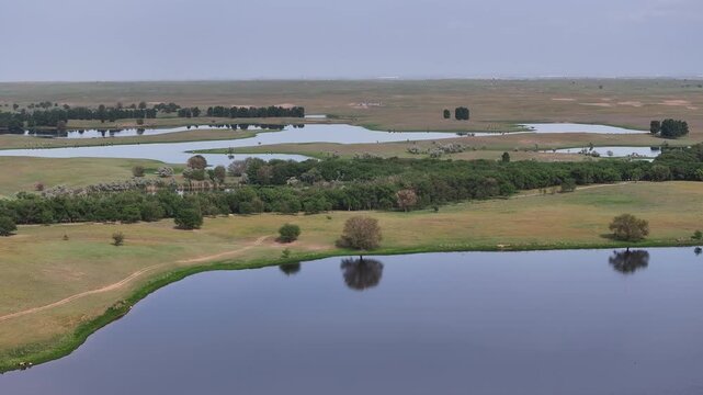 A quadcopter view of picturesque lakes in the steppe on a spring day near the Kazakh city of Almaty.