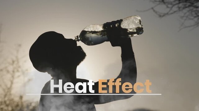Silhouetted individual pouring water onto head from plastic bottle seeking relief from extreme heat and dehydration dynamic clip showing movement and cooling effect