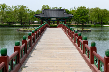 Fototapeta premium Symmetrical view of the long bridge leading to Poryongjeong Pavilion