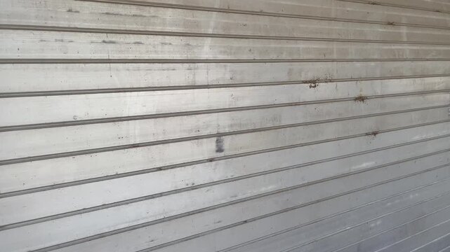 Grey metal rolling door