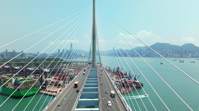 Stonecutters Bridge Driving Forward With Container Port And Hong Kong Skyline In Background, Showing Traffic, Transport, Shipping, And Cargo Freight Transportation