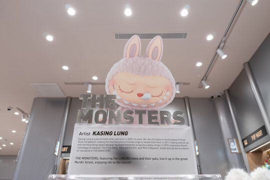 PENANG, MALAYSIA - FEB 09, 2026: Close up of The Monsters Labubu artist display sign featuring Kasing Lung inside Pop Mart retail store.