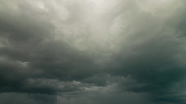 Fast moving thundercloud mass forming over open tropical sea