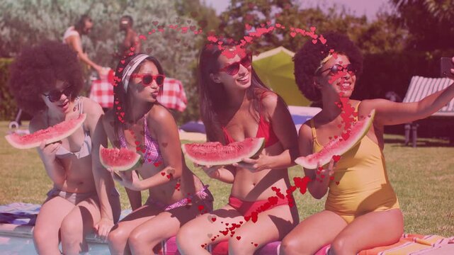 Four women sitting pool holding melon right woman taking selfie sparking heart overlay for promo