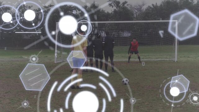 Soccer kicker in yellow running and striking FK HUD overlay tracking ball aiming right seeking goal