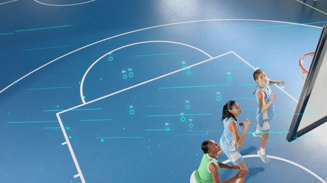 Sports guard dribbling from baseline into key, shooting layup scoring as turquoise overlay shifting