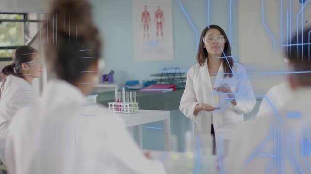 Teacher lifting test tube in lab causing blue red overlays forming schematic lines teaching science