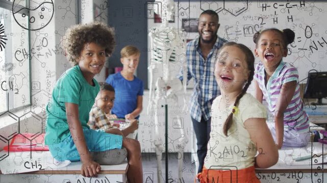 Camera cueing teacher and students turning to lens, posing while science diagrams overlaying scene