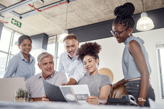 Business, people and reading folder in meeting for real estate, property sales and finance report. Office, team and happiness with paperwork for financial review, annual performance and auction price