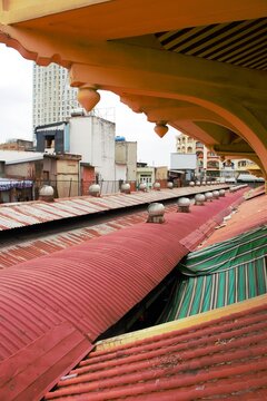 Ho Chi Minh City, Vietnam - April 2026: Curved architectural details and colorful rooftop structures at Binh Tay Market, also known as Cholon Market, in Ho Chi Minh City, Vietnam.