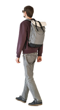 Full length portrait of a young man walking isolated transparent PNG, student men full body photo with transparent background precisely cut out with clipping path.