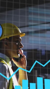 Vertical video: Site manager lifting phone checking data while bar chart and numeric HUD animating