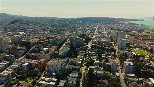 Drone flight above San Francisco neighborhoods Bay and Golden Gate Bridge