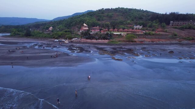 A stunning aerial drone view of Dapoli Beach along the Konkan coastline in Ratnagiri district, Maharashtra, India. 
