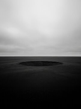 Black Hole Void Over Volcanic Plain &mdash; Conceptual Fine Art