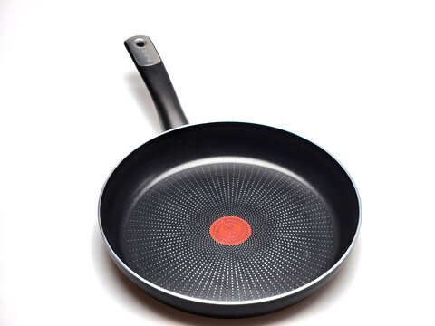 Close up view of Tefal nonstick frying pan with Thermo Signal indicator isolated on white background. Sweden. 