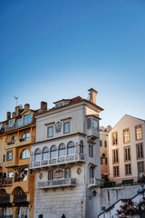 Obraz premium Historic Portuguese Architecture with Ornate Facade and Balconies