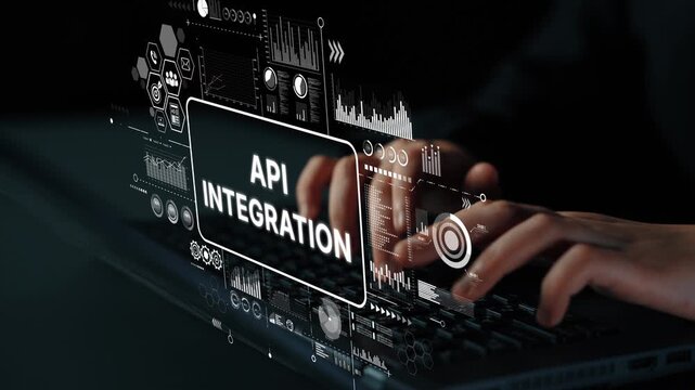 Hands Typing on Laptop with API Integration Concept and Data Visualization Elements in Background. Asymptotic smart data analytic.