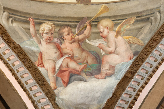 CREMA, ITALY - MARCH 20, 2026: The fresco of baroque angels with the symbols of David the church Santuario di Santa Maria della Croce by brothers Giuseppe and Giovanni Antonio Torricell from year 1762