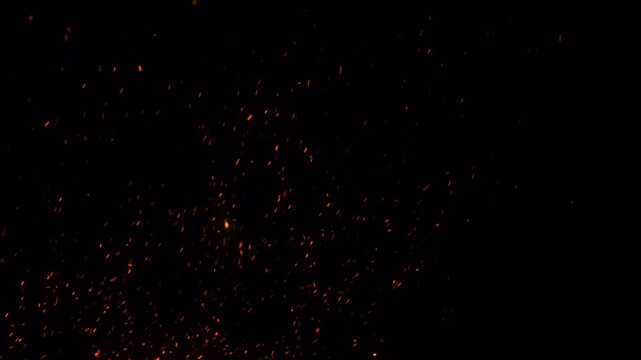 Floating fire flame sparks particles on transparent background video, looping alpha channel
