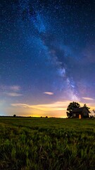 Fototapeta premium Milky Way over rural landscape scene.