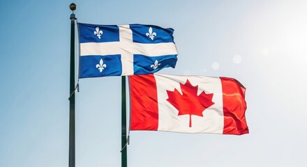 Naklejka premium Celebrating canada day flags of canada and quebec flying high against blue sky