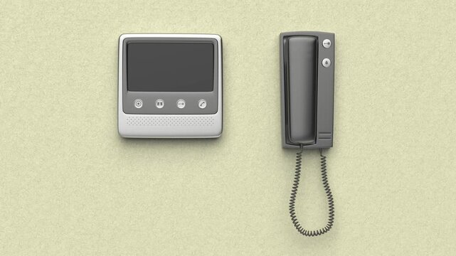 Different types of intercoms mounted on a wall