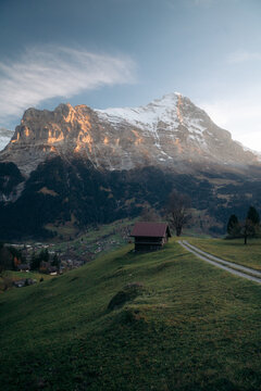 Autumn mountain scenery in the Swiss Alps with famous Eiger Nordwand at sunset, Grindelwald, Switzerland
