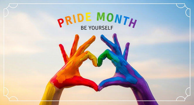 Two hands painted with rainbow colors form a heart shape against a sky, symbolizing LGBTQ+ pride, love, and self-expression during Pride Month.