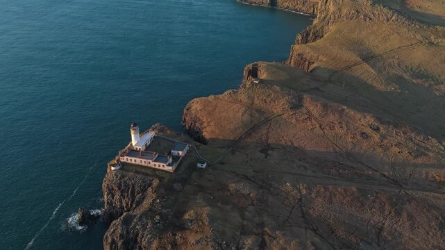 Stunning aerial view of the famous neist point lighthouse, located on the duirinish peninsula on the scenic isle of skye in scotland