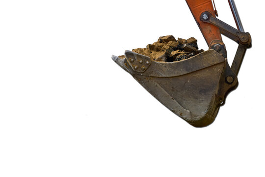 Bucket.Loading road debris with an excavator into dump truck
